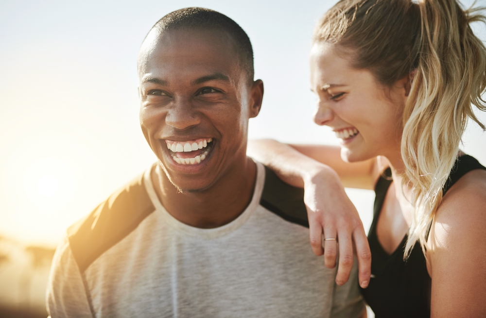Smiling couple together outdoors